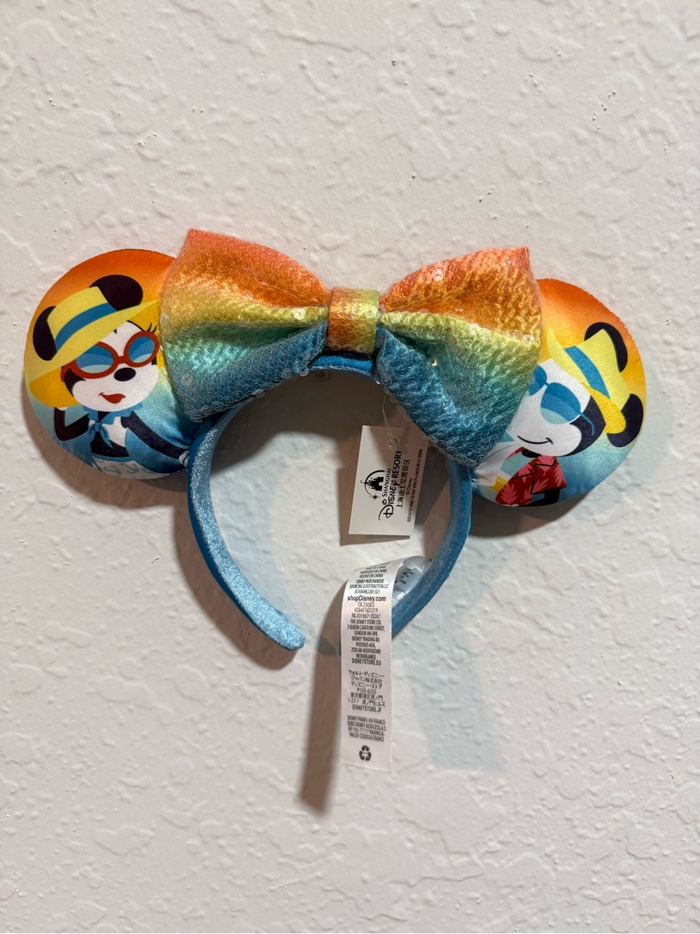 Disney Rainbow Sequin Bow Ear Headband with Blue Band